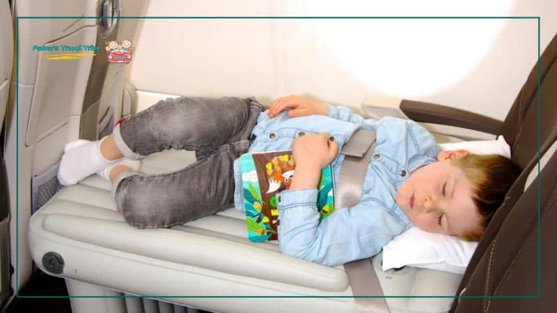 Flyaway Kids' Bed, child sleeping on inflatable bed on plane, child sleeping on plane