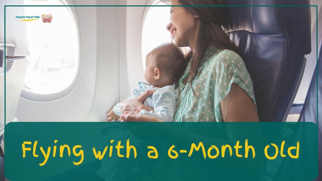 mom and baby staring out the window of an airplane. tips for flying with a 6 month old