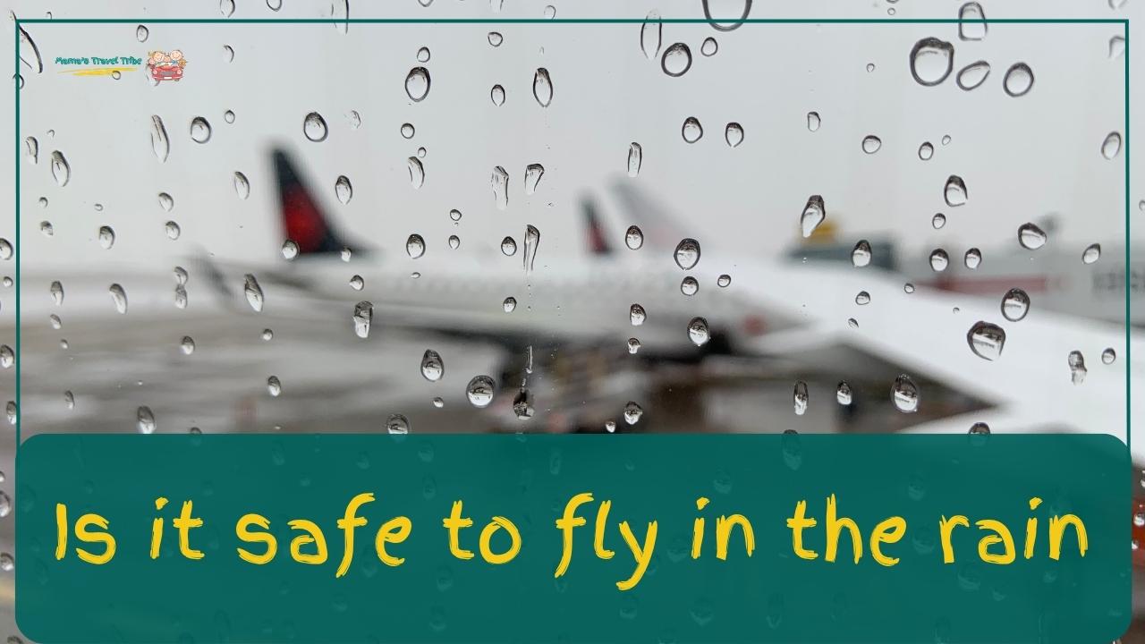 A plane on the runway with the looking window stained with water droplets.is it safe to fly in the rain