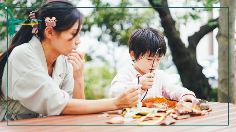 Camping activities for toddlers. Nature crafts for kids. Kid doing crafts with mother