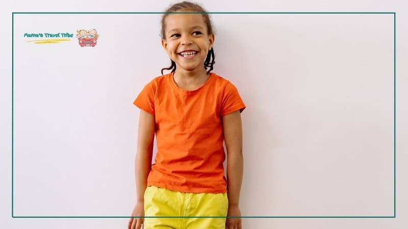 child in neon coloured clothes. Insect protection and staying visible do more work than parents think. Family Travel Safety Guide: Practical Safety Tips for Babies, Toddlers, and Young Kids