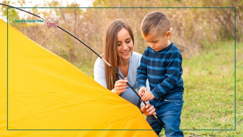 Mother and Son setting up outdoor camp. The Ultimate Family Travel Packing List for Babies, Toddlers, and Preschoolers. Outdoor, hiking, and camping packing with toddlers