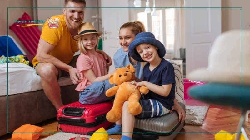 Parents and children packed and ready to go for a trip. The complete family travel packing approach. Traveling With a Baby and Toddler: Parent Guide
