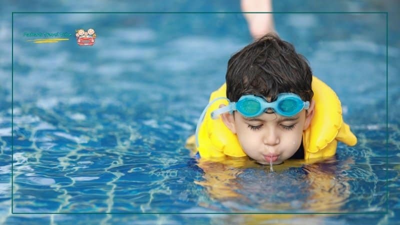 baby in pool. toddler in pool. Family Travel Safety Guide: Practical Safety Tips for Babies, Toddlers, and Young Kids